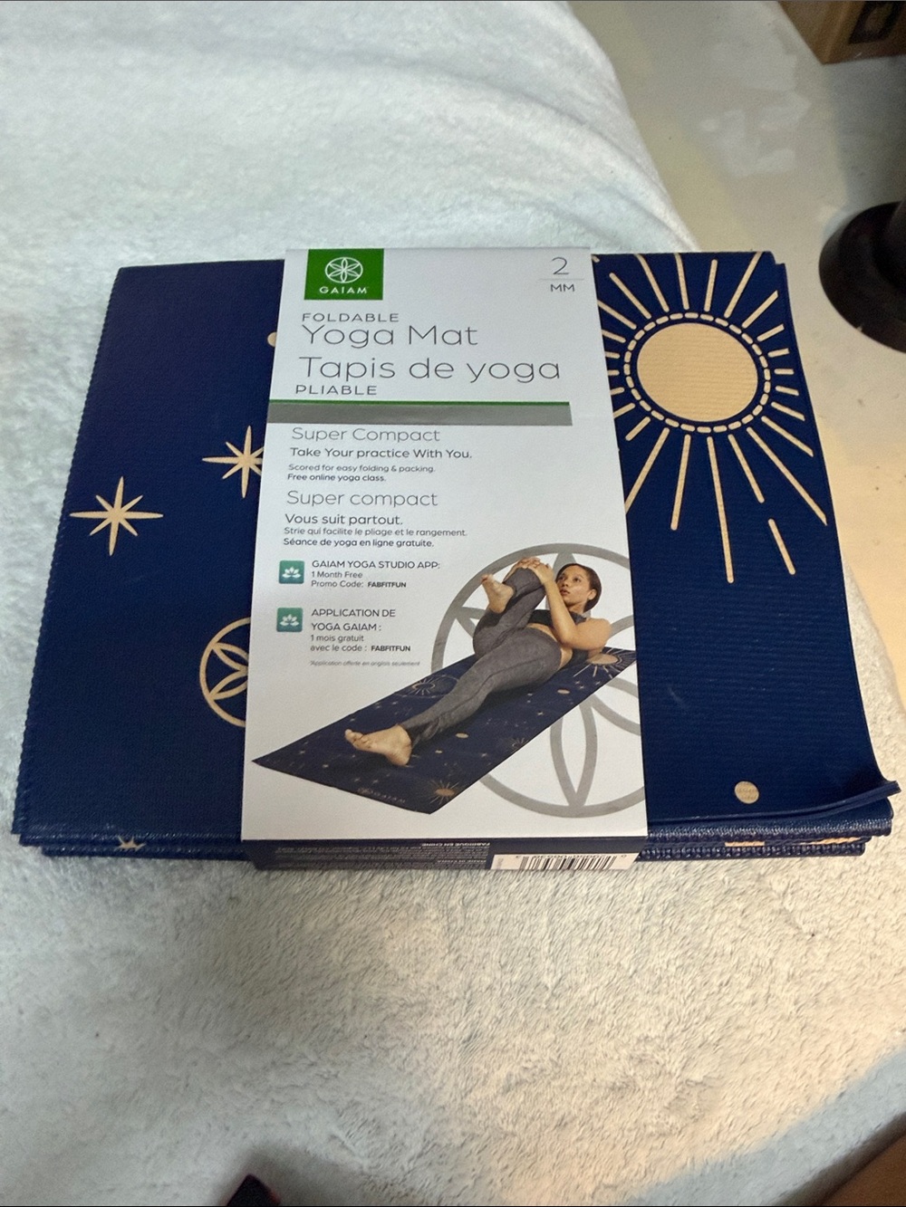 GAIAM Foldable Yoga Mat - Navy with Gold Celestial Design